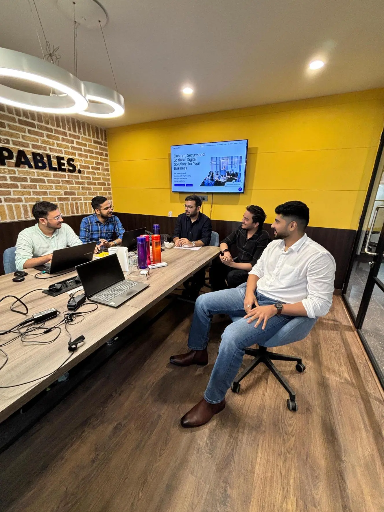 Perimattic team collaborating on AI projects