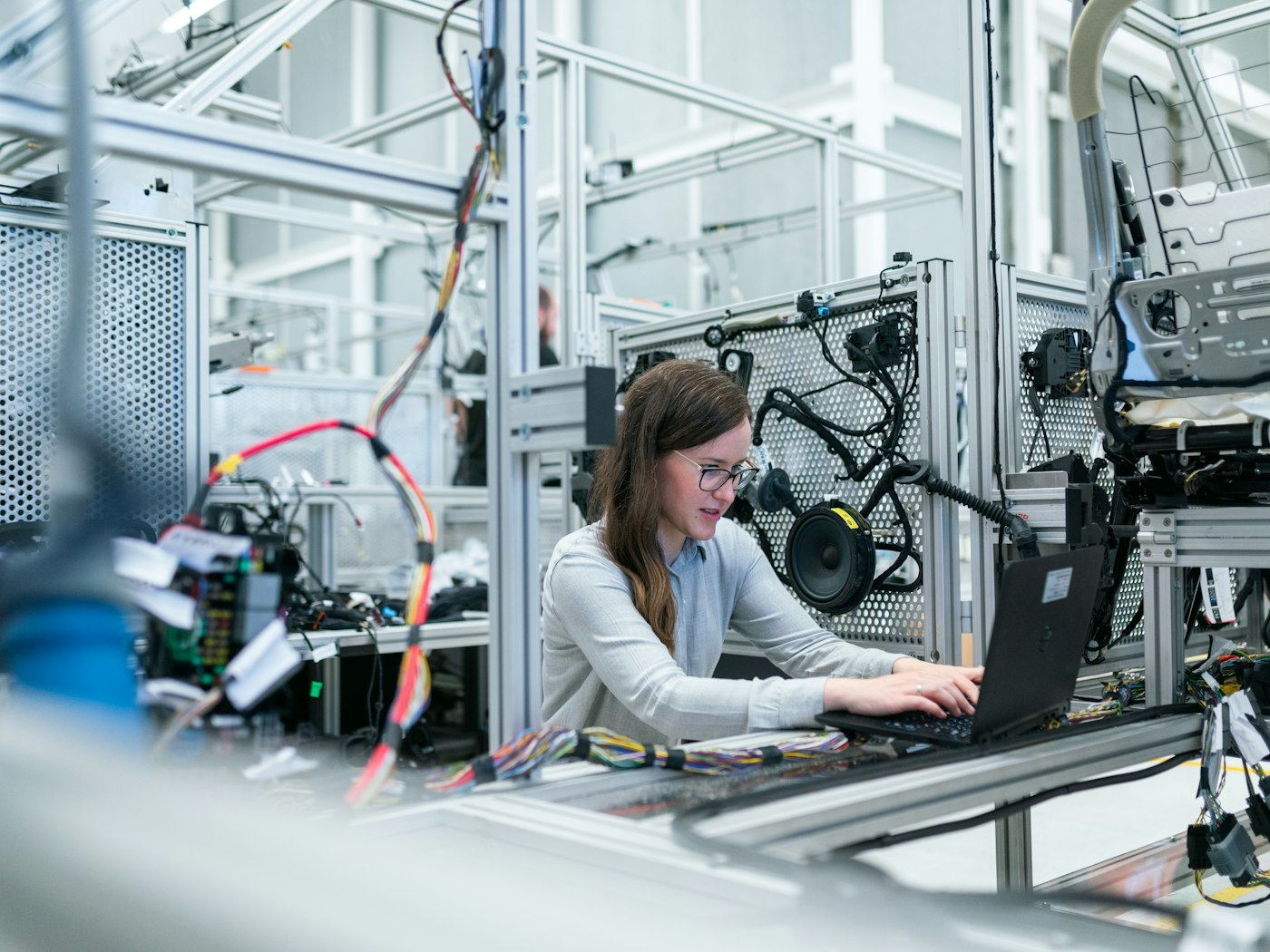 Manufacturing engineer reviewing live production data on the shop floor