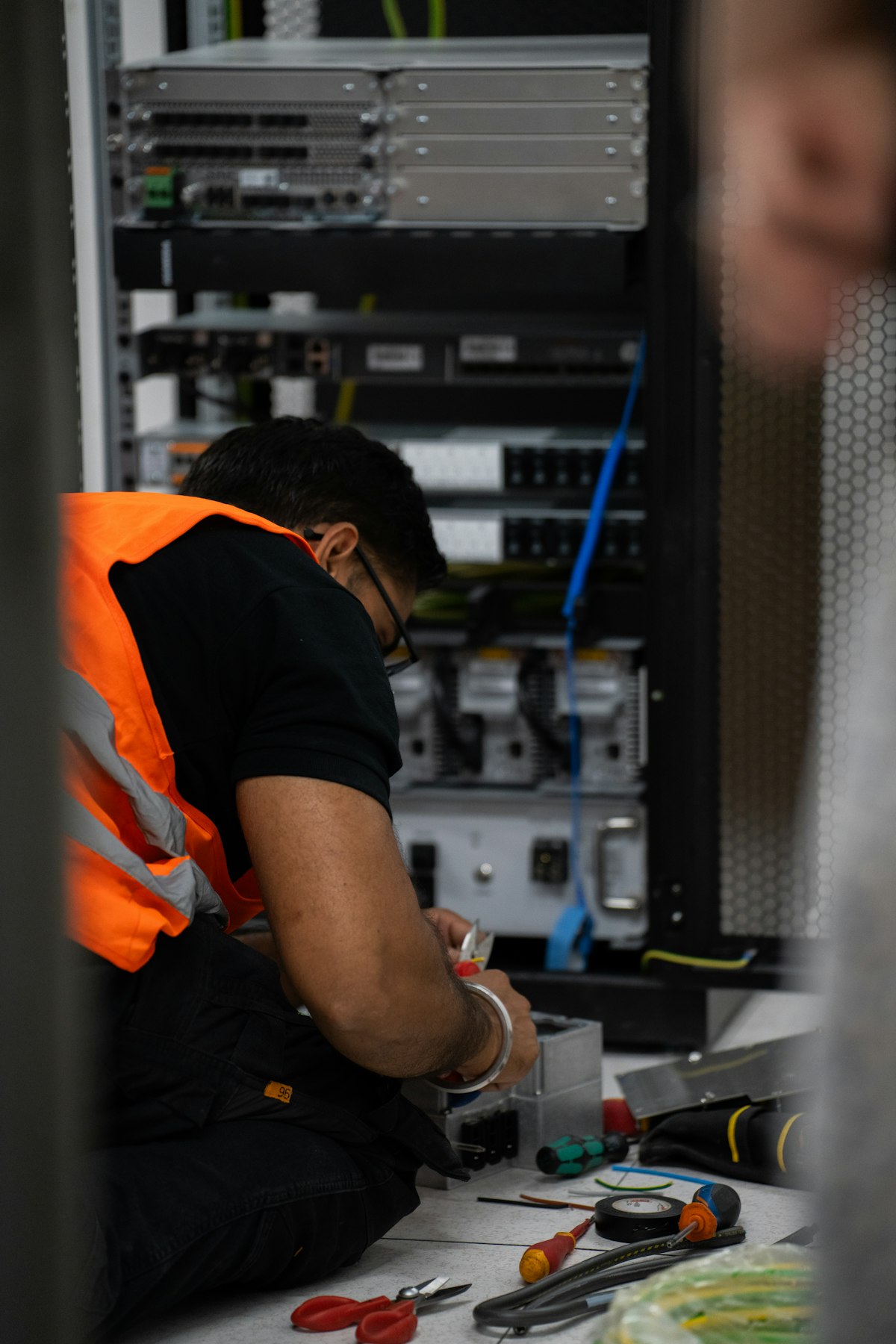 Technician preparing network and server infrastructure ahead of an Intellyx deployment