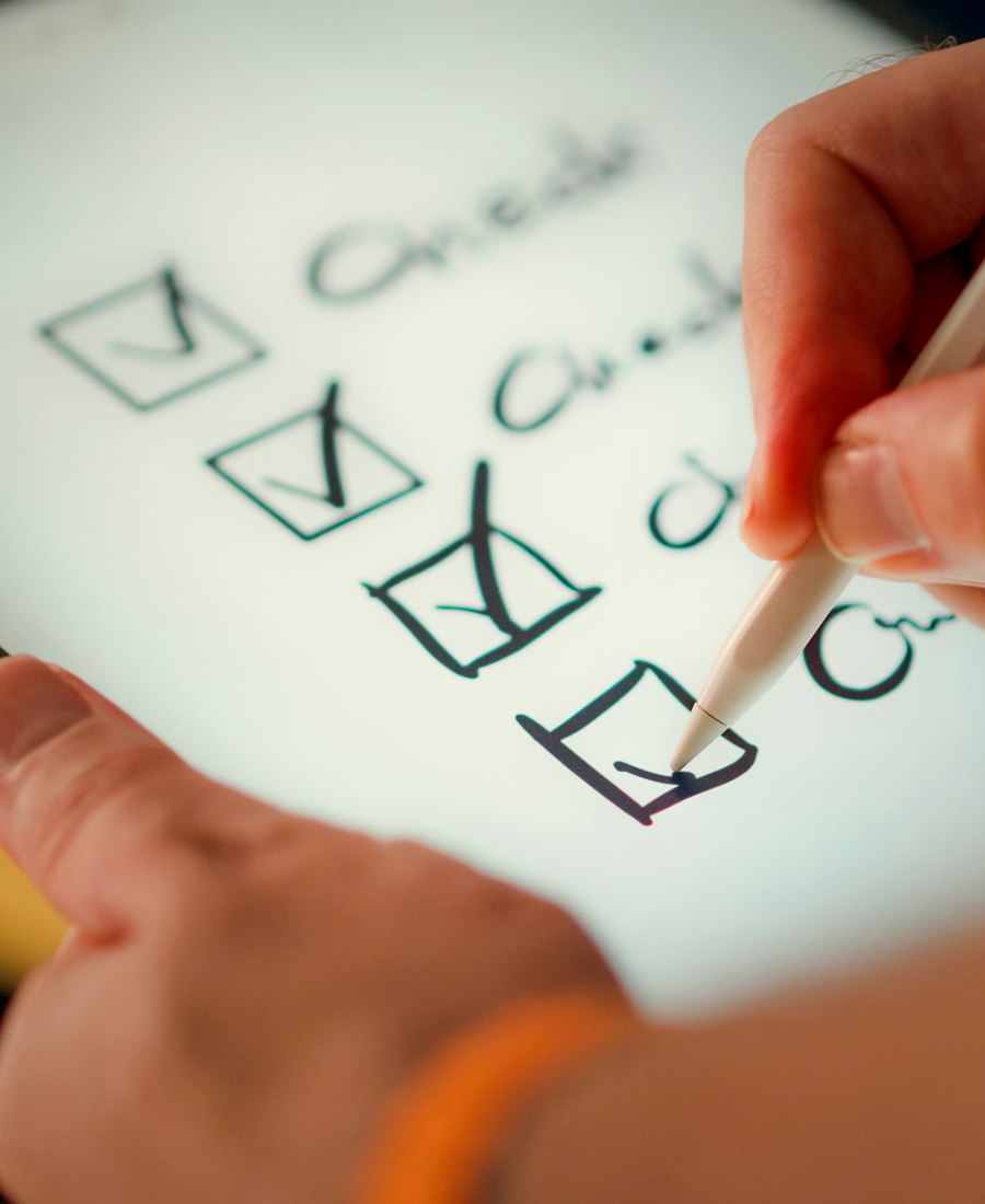 Reviewing a shift checklist on a tablet